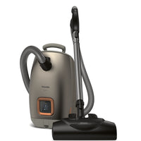 Miele Guard L1 Electro Canister Vacuum - Grey-Optimized Performance - Designed for both carpets and hard floors, featuring an Electro Plus floorhead with five adjustable carpet height settings and universal floorhead for smoothly transitioning between hard floors and thin carpets with a footswitch.