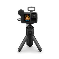 GoPro HERO13 Black Creator Edition Action Camera Bundle-The HERO13 Black Creator Edition combines our best camera with the pro-grade mounts and accessories you need to tell your story right out of the box. It includes the Volta (Battery Grip / Tripod / Remote), Media Mod and Light Mod that seamlessly come together in a lightweight design that’s comfortable enough to carry through an all-day production.