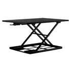 Mount-It! 32" Height Adjustable X-Lift Standing Desk Converter - Black-MI-7929 can support 20 pounds and has a spacious tabletop measuring 32" x 22"
