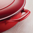 Tramontina 6.5 Qt Enameled Cast Iron Series 1000 Covered Round Dutch Oven - Gradated Red-Elegant and Resilient Design: Features a porcelain-enamel exterior with a sprayed finish for durability and a stylish touch to complement any kitchen