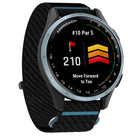 Garmin Approach J1 Smartwatch - Cloud Blue Aluminum Bezel with Black/Azure ComfortFit Fabric Band-Tee-off guidance: With forward tee locations down the fairway on more than 43,000 golf courses, every hole is scaled to the golfer’s ability