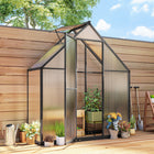Outsunny Polycarbonate Greenhouse with Swing Door & Adjustable Window - 5.5' x 6.5'- UV-resistant polycarbonate panels shield plants from harsh sunlight
 
