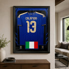 Frameworth Official FIFA World Cup 2026 Italy Riccardo Calafiori Framed Replica Jersey - 25.75" x 33.75"-Professionally framed in Canada, with the replica jersey mounted in a premium black frame and a clear protective front.