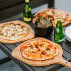 Solo Stove Bamboo Pi Peel-16" Bamboo Peel is an upgrade in both size and functionality. At 16.3 inches wide, this pizza peel handles up to 16-inch pizzas. An innovative stainless steel tip keeps the peel tip from cracking and burning, while a leather loop makes it easy to hang your peel.