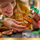LEGO Harry Potter Hogwarts Herbology Plants-Place 2 magical plants on the table, and add the decorative vine and earmuffs