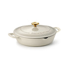 Tramontina Bestow 4 Qt Enameled Cast Iron Round Braiser with Lid - Porcelain Enamel Finish - Latte-Self-basting condensation ridges on lid uniformly collect and direct vapors onto food