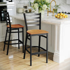 Flash Furniture HERCULES Series Black Ladder Back Metal Restaurant Barstool - Natural Wood Seat-Ladder Back Design