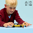 LEGO City Great Vehicles Yellow Taxi-Model building kit featuring a toy taxi, plus driver and tourist minifigures