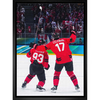 Frameworth Celebrini and Marner OT Celebration Hockey Canada 2026 - Framed Canvas - 22.5" x 31.5"-Officially licensed Hockey Canada canvas collectible featuring Macklin Celebrini and Mitch Marner capturing the electric 2026 overtime celebration moment. 20x29 inch premium framed canvas