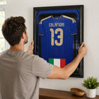 Frameworth Official FIFA World Cup 2026 Italy Riccardo Calafiori Framed Replica Jersey - 25.75" x 33.75"-Handcrafted in Canada by Frameworth Sports Marketing, established 1992, producing officially licensed sports memorabilia.