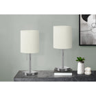 Monarch Specialties 17" H Table Lamp - Nickel Metal / Ivory / Cream Shade - Set Of 2-Each lamp has a pull chain mechanism for an easy on/off switch, along with a USB port embedded in the base to conveniently re-charge your devise