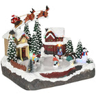 HOMCOM Animated Plug-In Lit Christmas Village with Santa and Deer-Features two houses, Christmas trees, a Santa Claus, a reindeer, a sled, a snowman, and children skating 