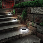 Bell+Howell Vividisk Colour LED Solar Outdoor Pathway Lights - 4 Pack-Easy to install: setup in about 30 seconds remove from box, place outside to charge, then enjoy colourful outdoor lighting after sunset