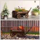 Outsunny Wooden Wagon Planter Box with 4 Wheels & Handle-Carbonized fir wood structure holds up to 66 lbs for outdoor use
