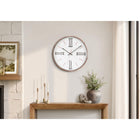Monarch Specialties 9094 14" Round Wall Clock - Gold Frame-Visually appealing with a clear glass surface and bold roman numeric markings, this analog clock is easy to read from a distance