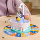 Spin Master Bluey Splash Time Game Wet Dog Shaking Game with Bluey Figure by Spin Master - 2-4 Players - Ages 4+-Fun, Suspenseful Tension: Any press of the button or turn of the faucet can trigger Bluey to shake herself dry, unexpectedly sending water toward the players – if she shakes, it's back to the start