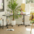 HOMCOM 28" Pneumatic Height Adjustable Standing Desk with Wheels - Black Wood Grain-Four wheels with brakes ensure easy mobility and stationary stability