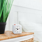 Marathon Watch Mini Non-Ticking Analog Alarm Clock with Auto Back Light and Snooze Function - White-Auto-night light: an ambient light sensor triggers a soft glow to illuminate the dial when placed in low light.