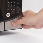 Commercial Chef 0.9 cu. ft. 900W Countertop Microwave - Black-Impressive Features: When it comes to countertop microwave ovens, our stainless steel microwave cooker is superior with 900 watts of power, a convenient push button, turntable roller, glass tray, & wave guide.