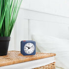 Marathon Watch Mini Non-Ticking Analog Alarm Clock with Auto Back Light and Snooze Function - Blue-Auto-night light: an ambient light sensor triggers a soft glow to illuminate the dial when placed in low light.
