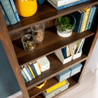 Sauder Arch 5-Shelf Bookcase - Grand Walnut-Adjustable shelving: Three adjustable shelves for flexible storage options. Each adjustable shelf has a maximum weight capacity of 25 lb