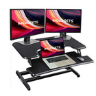 IMHome Sit Stand Desk Riser Standing Desk Converter with Keyboard Tray - 33" - Black-The integrated gas-spring assisted lift mechanism allows smooth vertical adjustment using a simple squeeze handle. You can position the desk anywhere between 4.3" and 19.3", helping maintain proper monitor height and a comfortable working posture while reducing neck and back strain