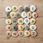 Yellow Door 26-Piece Uppercase Alphabet Pebbles-Ideal for letter recognition