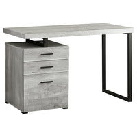 Monarch Specialties 7409 48" Computer Desk - Grey Reclaimed Wood/Black Metal-A modern 48"L computer desk in a fashionable style, with a reversible configuration for left or right setup, perfect to create a functional workspace in your home office.