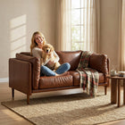 HOMCOM 59" PU Leather Loveseat Sofa with Wide Seat - Brown-Robust multilayer board and metal frame with rubberwood legs supports up to 528 lb.  