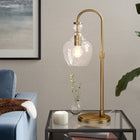 Hudson&Canal Verona 27" Tall Arc Table Lamp with Glass Shade - Brushed Brass/Clear-Rated for one 60W incandescent bulb - 9W LED bulb, 13W fluorescent (CFL) bulb, or 9W self-ballasted LED bulb, E26-base bulb, Bulb not included