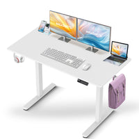 IMHome Height Adjustable Electric Standing Desk with 3 Memory Settings - 47" x 24" - White Top/White Frame-Elevate your workspace with the IMHome Electric Standing Desk, a versatile and feature-rich solution for home offices and professional setups. This sit-stand desk offers smooth electric height adjustments from 28" to 47" (72cm to 118cm), allowing you to seamlessly switch between sitting and standing. With a built-in 3 memory settings, you can save your favorite height settings for ultimate convenience.