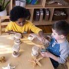 Guidecraft Treasure Tubes - Clear-Flat, easy-to-remove top keeps objects secure and creates options for stacking