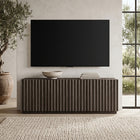 Hudson&Canal Marion Rectangular Fluted TV Stand for TV's up to 75" - Brown Oak-Base is crafted of sturdy MDF materials with MDF doors with PVC accents in a Brown Oak color