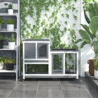 PawHut 35" H Indoor Rabbit Hutch with Wheels, Run and Tray - Grey-Rolls on wheels for easy movement. And two have brakes 