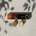 Delta Q Cinnamon Espresso Capsules - 10 Pack-These Cinnamon coffee capsules take you on a journey of sweet spices. This well-balanced espresso from DeltaQ blends with notes of cinnamon, hazelnuts and roasted nuts to give you an aromatic, slightly acidic coffee.