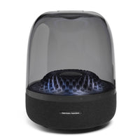 Harman Kardon Aura Studio 4 - Black-Listen to music the way it was meant to be heard. Your music is reproduced with pinpoint accuracy, thanks to the speaker's distinct channels and dedicated amplifiers, reproducing every sonic detail with breathtaking clarity. Feel every beat from a 5.2" down-firing subwoofer powering deep, rich bass tones. And the wide soundstage of the 6-speaker array is the next best thing to experiencing your favourite songs live.