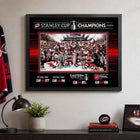 Frameworth Carolina Hurricanes 16" H x 20" Frame 2026 Stanley Cup Champions Team Celebration Framed Wall Art 16" x 20" W Frameworth - Licensed-Professionally framed in Canada: The image is printed on high-quality photo paper and professionally finished in a black frame with a clear protective front