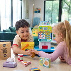VTech Count On Me Self-Checkout - French-Get fresh info by using the food buttons to hear tasty tidbits about fruit, vegetables, bread and more