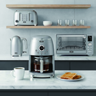 Salton NuRetro Digital 12 Cup Coffee Maker - Space Cherry-Wake up to freshly brewed coffee! Schedule your coffee in advance with the easy to program digital display. 