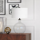 Hudson&Canal Laelia 24.75" Tall Table Lamp with Fabric Shade - Clear Glass/Blackened Bronze/White-Handcrafted clear glass and blackened bronze finish is applied to the round glass base