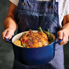 Tramontina 5.5 Qt Enameled Cast Iron Series 1000 Covered Round Dutch Oven - Gradated Cobalt-Elegant and Resilient Design: Features a porcelain-enamel exterior with a sprayed finish for durability and a stylish touch to complement any kitchen
