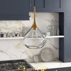 Hudson&Canal Ida 9.5" Wide Pendant with Glass Shade - Brass/Clear-Handcrafted brass finish is applied to the gourd metal base
