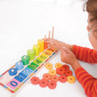 Bigjigs Toys Learn to Count Puzzle-Consists of 45 coloured discs and 9 numbered tiles. Ages 2 years and up.