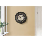 Monarch Specialties Clocks 16" Round Wall Clock - Antique Brown -This analog clock features a durable brown plastic frame with easy to read, printed roman numeric markings, and classic metal hands under a glass surface for accurate timekeeping