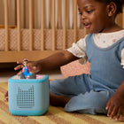 Tonies Ms. Rachel Toniebox 2 Starter Set - Sky Blue-Meet Toniebox 2 - the audio player designed for their hands, powered by their choices, and built to help them grow. The next generation audio player is screen-free for kids ages 1-9+, designed to promote independent, imaginative play