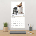DateWorks 2026 16-Month Wall Calendar - 12" x 12" - Buddies - English-Features monthly pages for January to December 2026, as well as the last 4 months of 2025