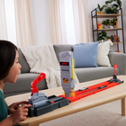 Hot Wheels Racing  F1 Grid Start-​Load two cars into the launchers, push up the lever on the start tower and focus on the countdown, then press the buttons to start racing