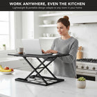 Mount-It! 32" Height Adjustable X-Lift Standing Desk Converter - Black-The X-lift base design allows this table top standing desk to raise or lower straight up and down, providing more stability and saving space