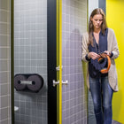 Tork Twin Jumbo Bath Tissue Roll Dispenser-Robust design with lock to protect the roll and stop pilferage in demanding environments
