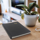 Brownline 2027 Daily Planner - 11" x 8-1/2" - Black-100% post-consumer recycled paper